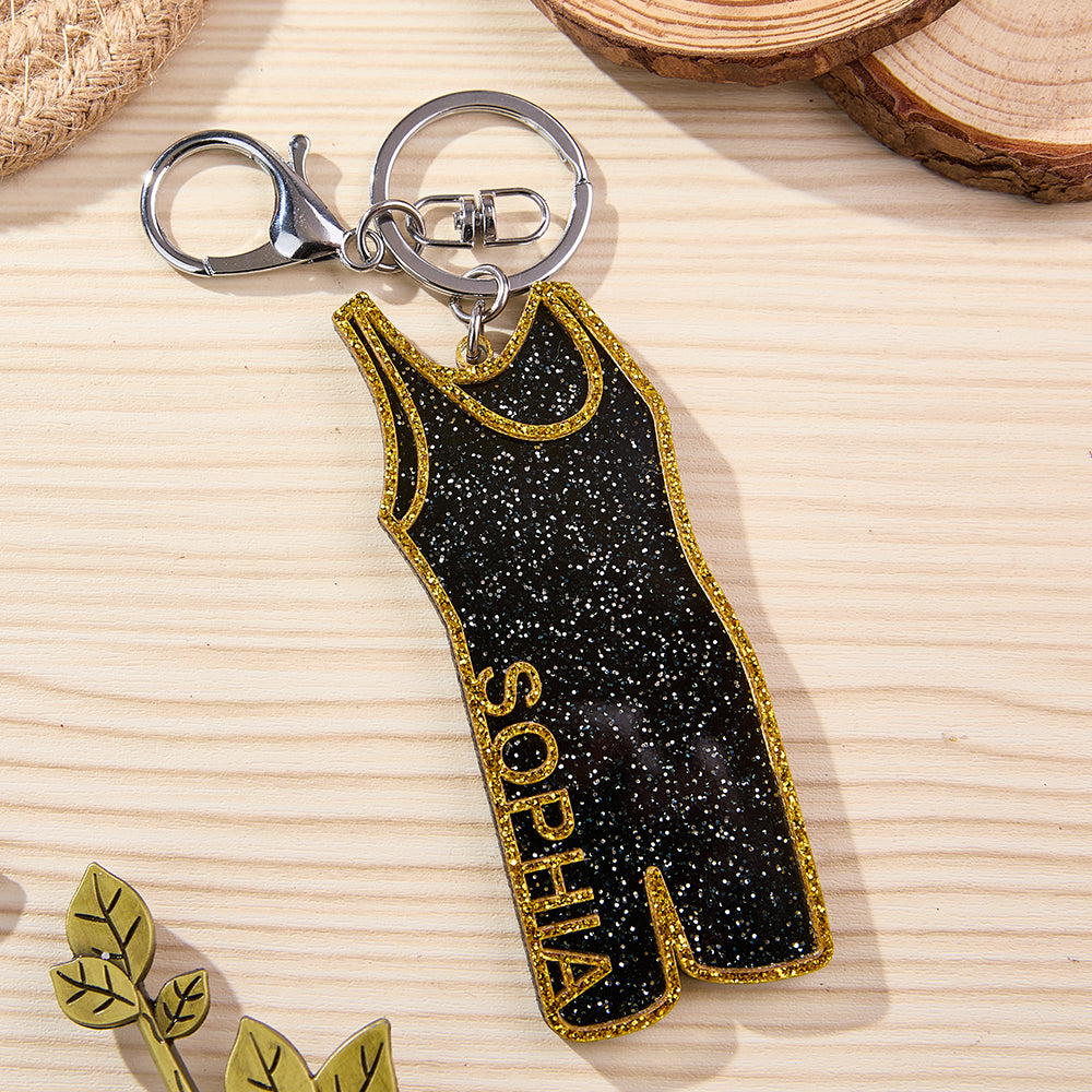Close-up of acrylic personalised wrestling keychain showing smooth finish and clear custom name print — durable wrestling singlet keyring