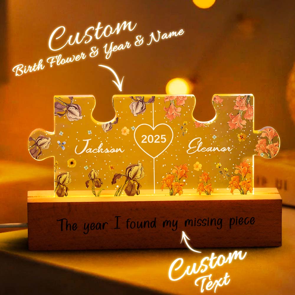 Unlit view of the personalised puzzle night light displaying clear acrylic etching of couple names and puzzle design, compact 15cm x 9cm size ideal for bedrooms and nurseries