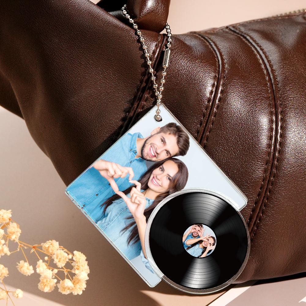Rear view of NFC vinyl record keychain showing design details and metal split ring – personalised music keyring for music lovers