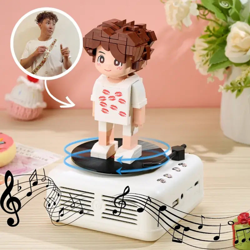 Packaged components and clear assembly instructions for the customisable one-person brick figure and Bluetooth speaker base — bespoke personalised gift kit