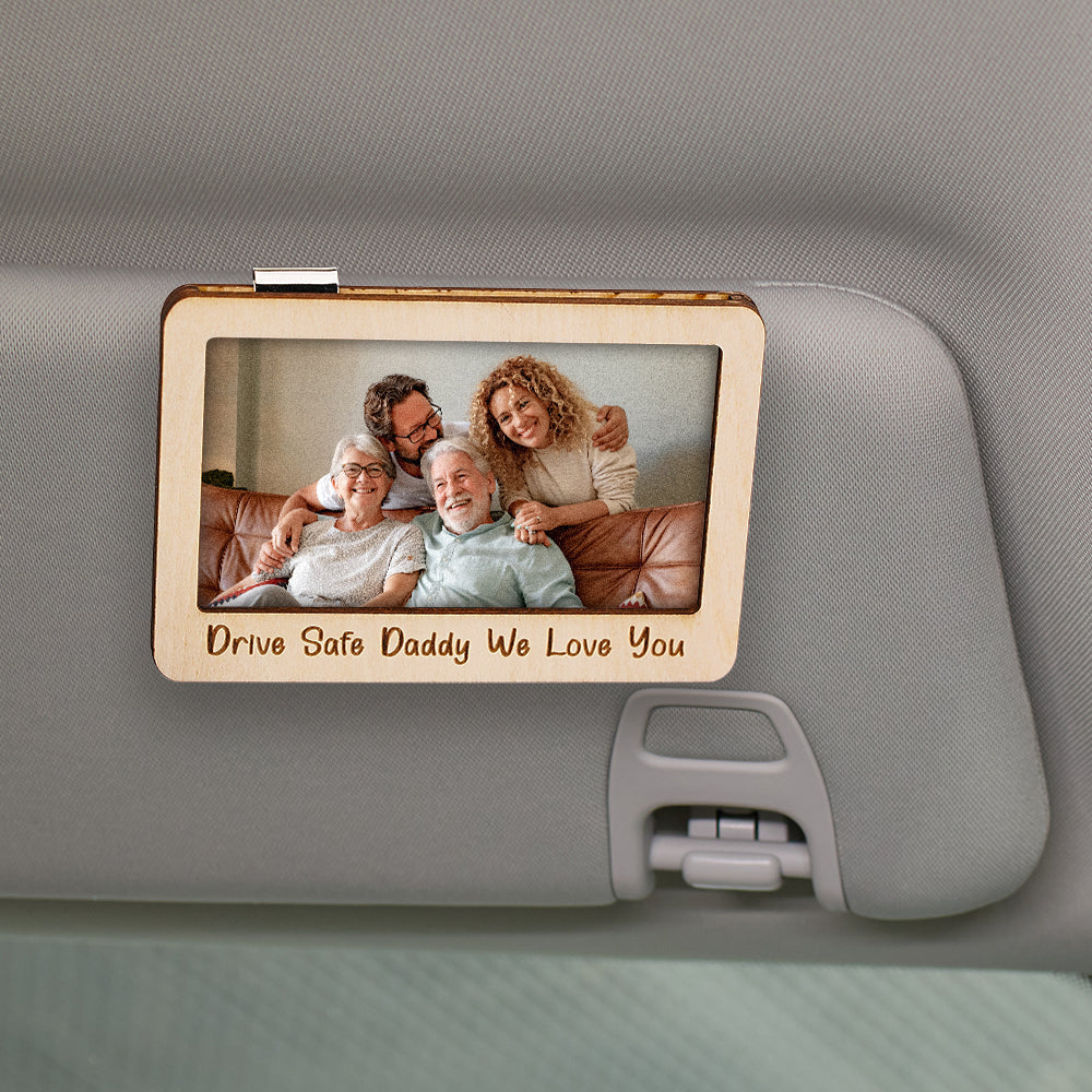 Close-up of the natural wood frame with magnetic backing for sun visor attachment.