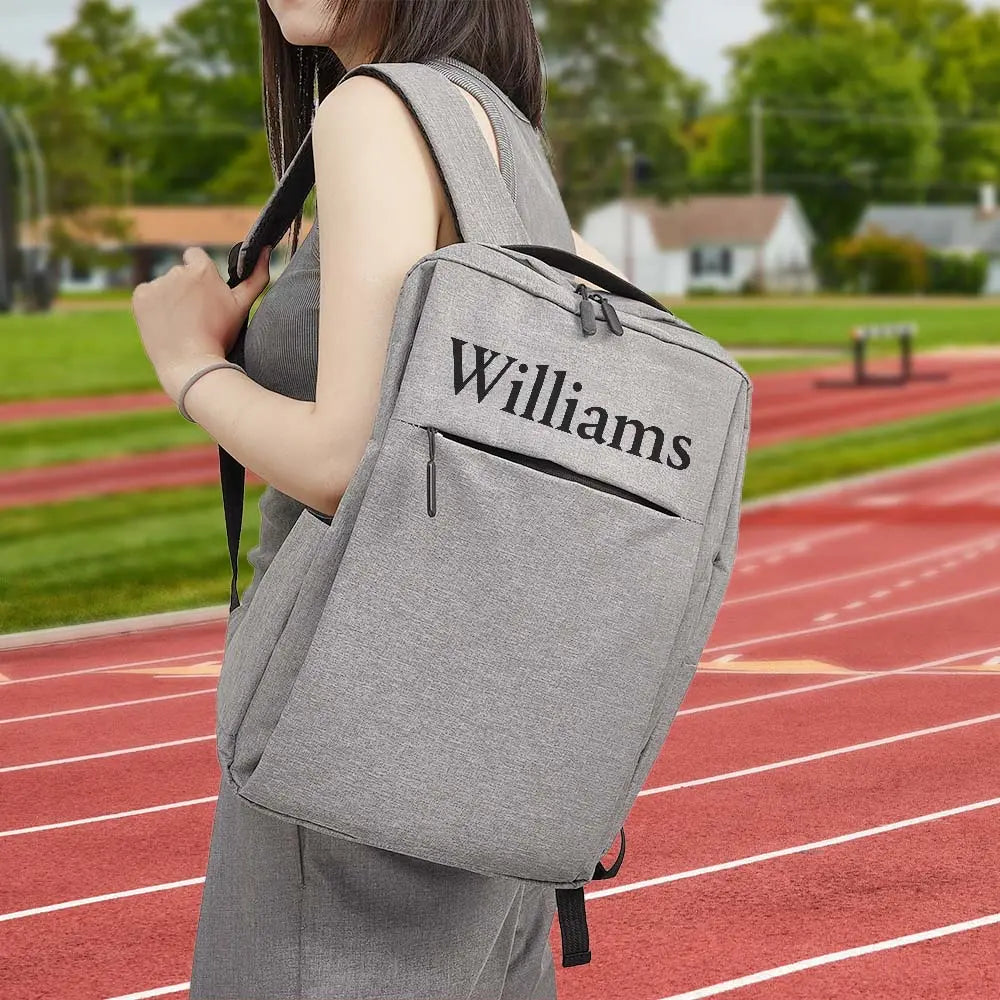 Close-up of personalised name detail on backpack showing neat custom finish — personalised name backpack and custom laptop backpack branding