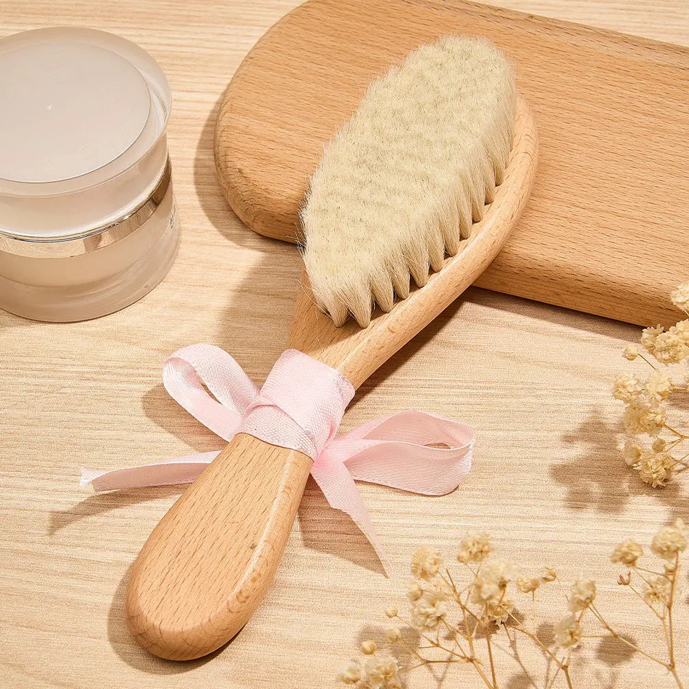 Engraved name detail on the wooden handle — personalised keepsake engraved baby brush perfect for christenings and newborn gifts