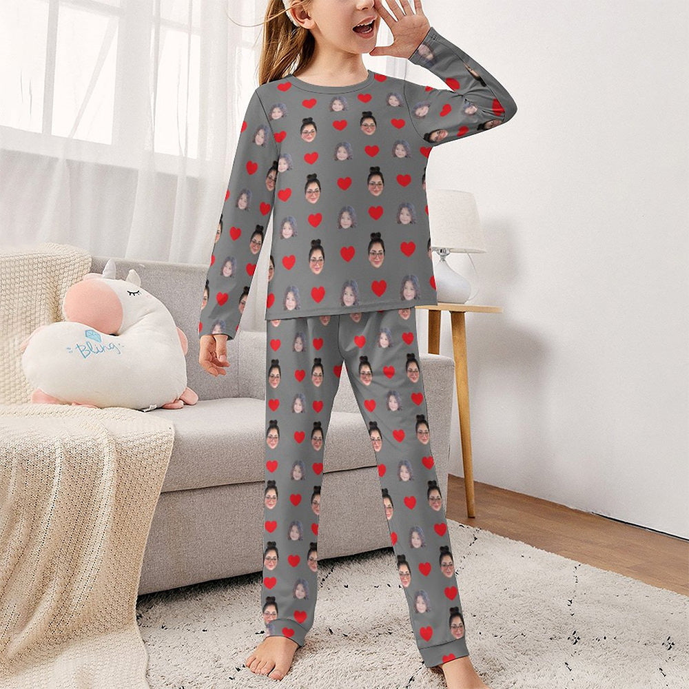 Close‑up of vivid heat‑transfer face print on long‑sleeve pyjama top showing bright colours and clear detail