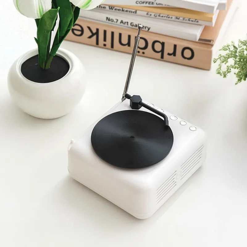 Detail of Bluetooth speaker base with grille and controls beneath personalised brick figure, demonstrating the custom brick figure speaker feature