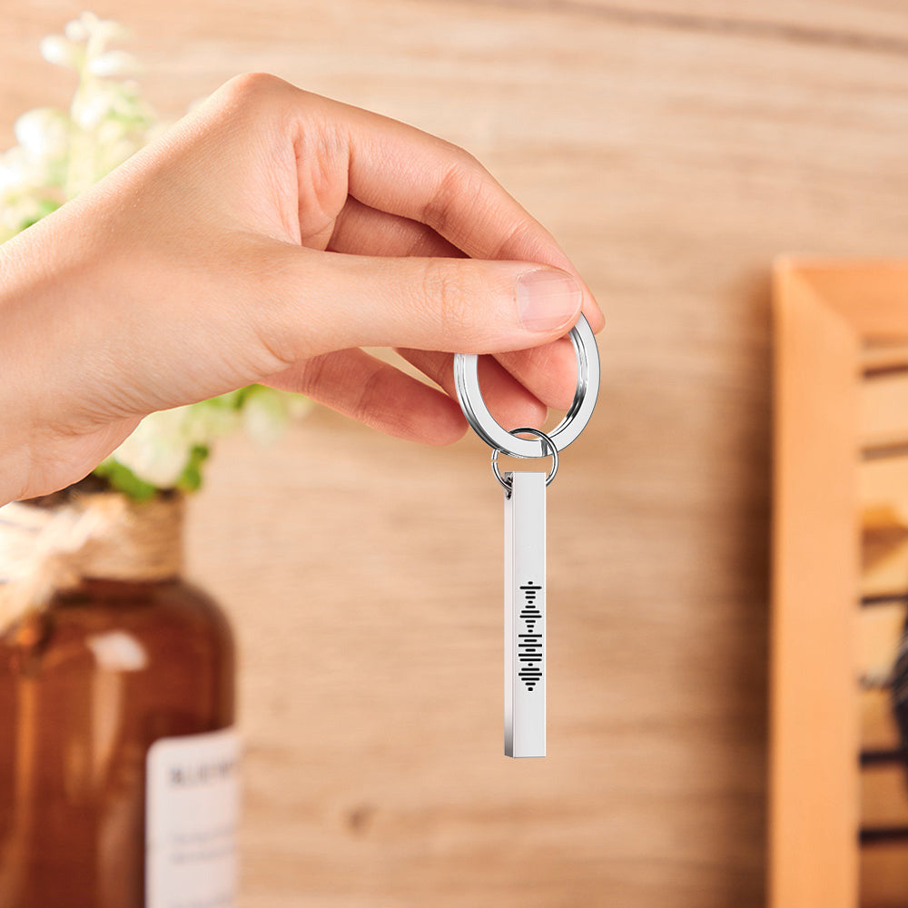 Gold finish personalised vertical bar keychain with laser-engraved Spotify code and custom message — stainless steel, polished edges