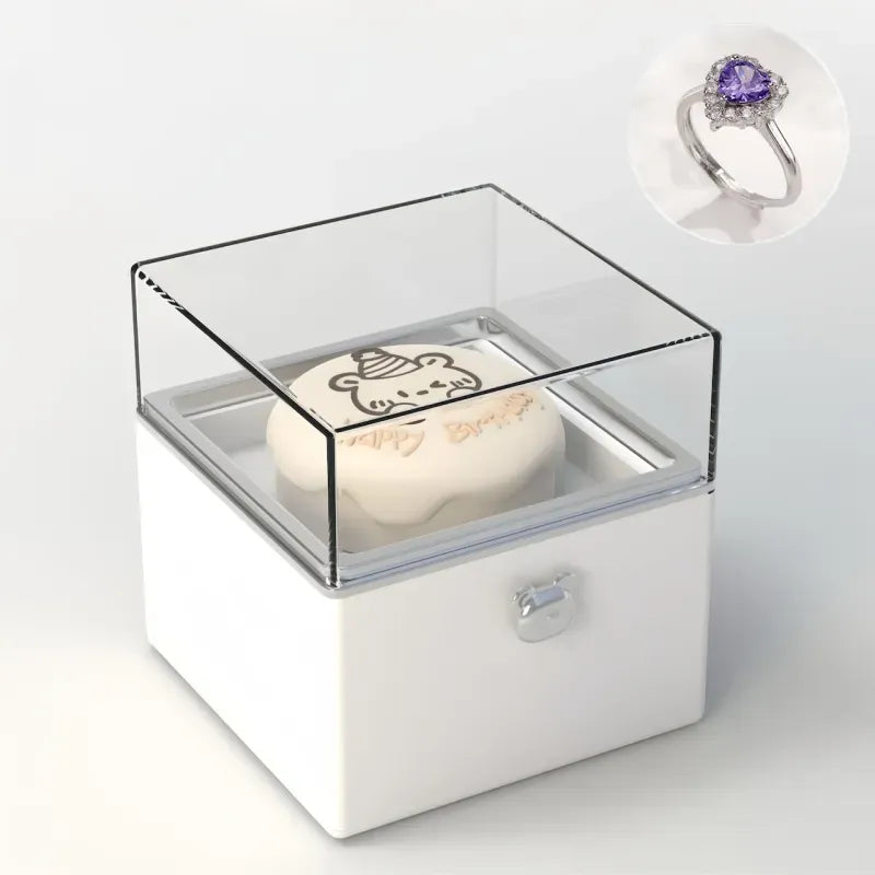 Close-up of the adjustable 1.8cm ring holder inside the copper Bear Cake Ring Box showing secure clasp and fine detail
