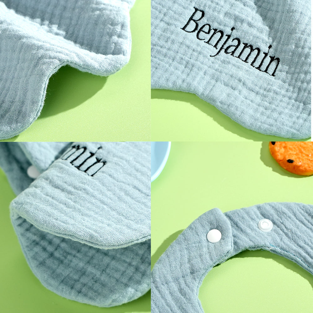 Personalised baby bib folded in gift packaging — embroidered name bib ready as a thoughtful newborn gift