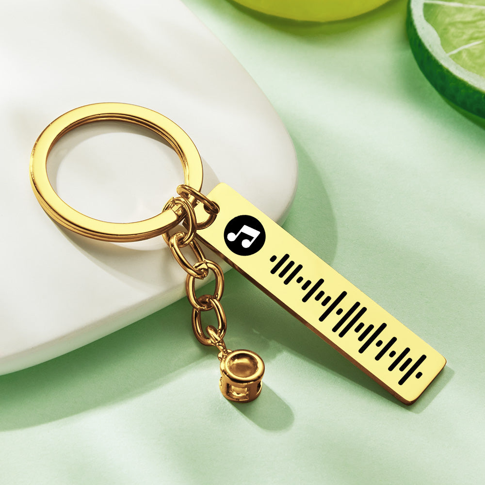 Personalised music code keyring attached to house keys and bag – everyday custom song keychain gift