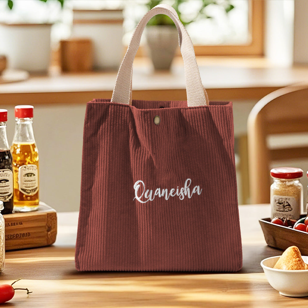 Personalised lunch bag presented as a gift with embroidered name – thoughtful birthday or party gift for children