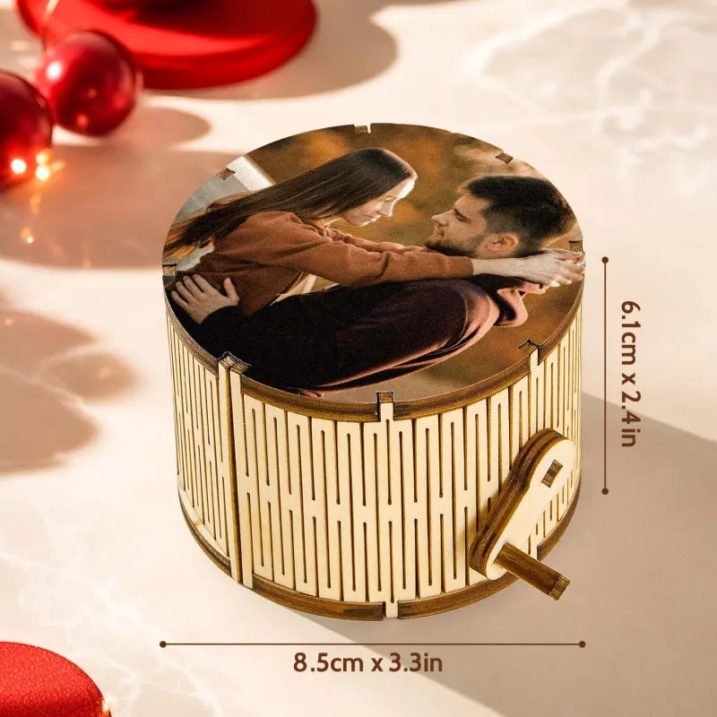 Close-up detail of button-activated MP3 player and USB charging port on personalised photo music box