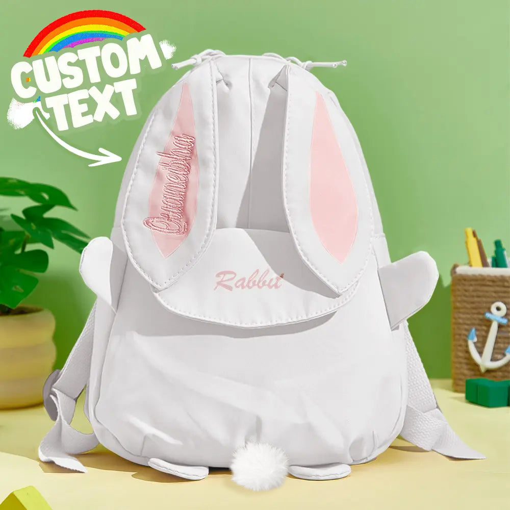 Open interior of personalised kids school rucksack showing main compartment and easy‑clean lining, compact 24×30cm size for toddler essentials