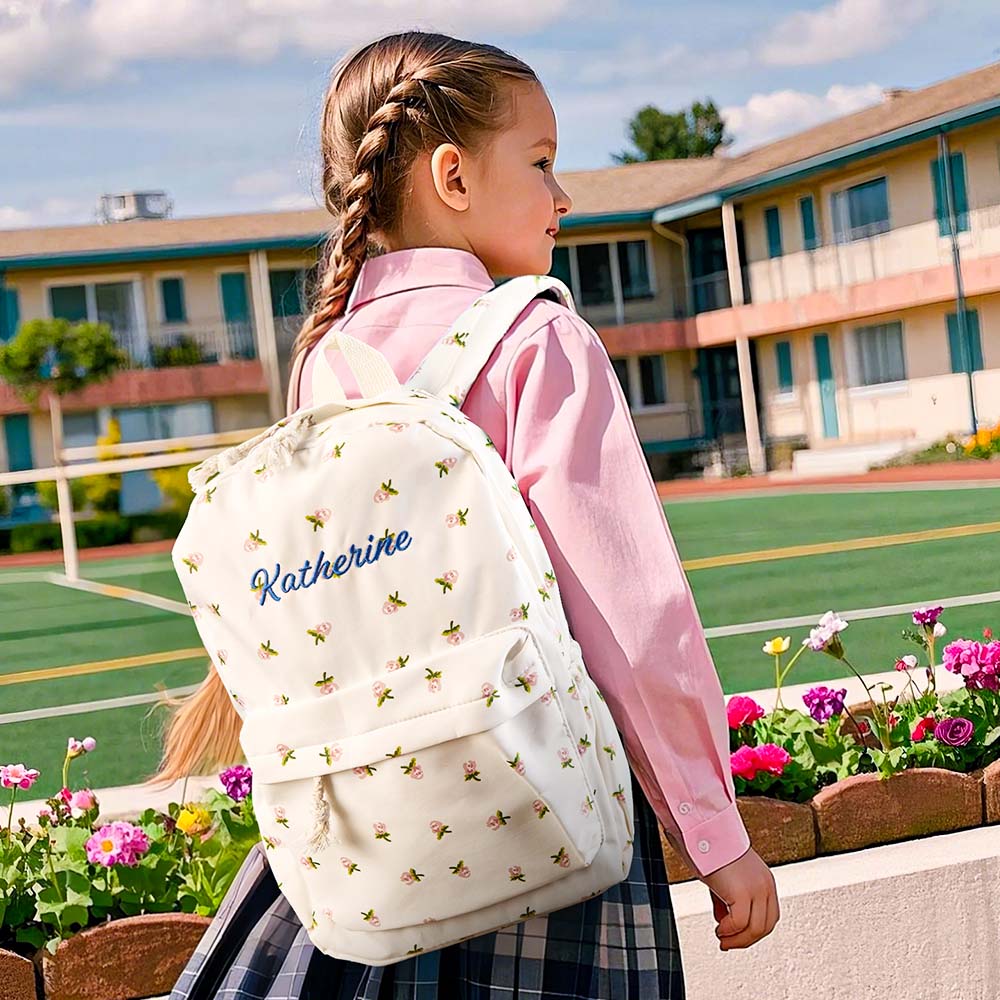 Interior view of personalised student backpack – roomy main compartment of nylon flower girl schoolbag for books and stationery