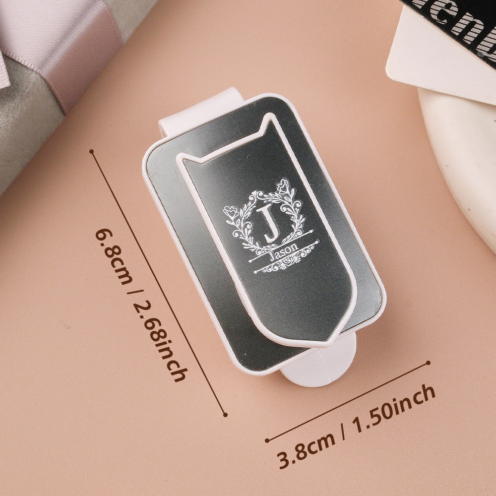 Personalised sun visor clip featuring a custom name, ideal as a thoughtful car gift.