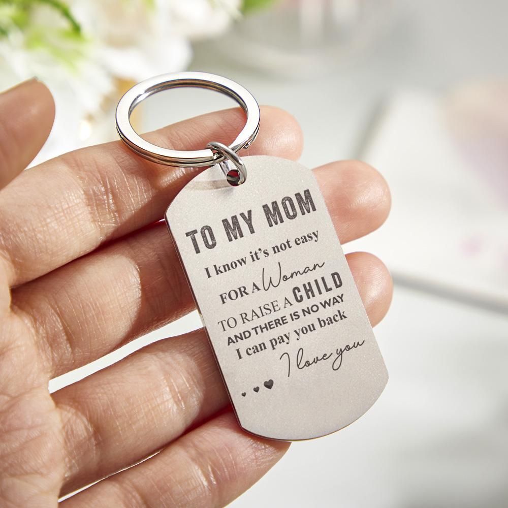 Close-up of stainless steel personalised keyring showing custom photo and the 'Drive Safe I Need You Here With Me' engraving – durable everyday gift for mum