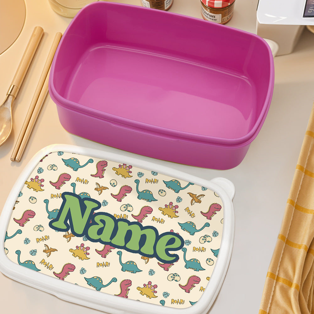 Personalised dinosaur lunch box open to show spacious interior – durable plastic snack container for nursery and primary school