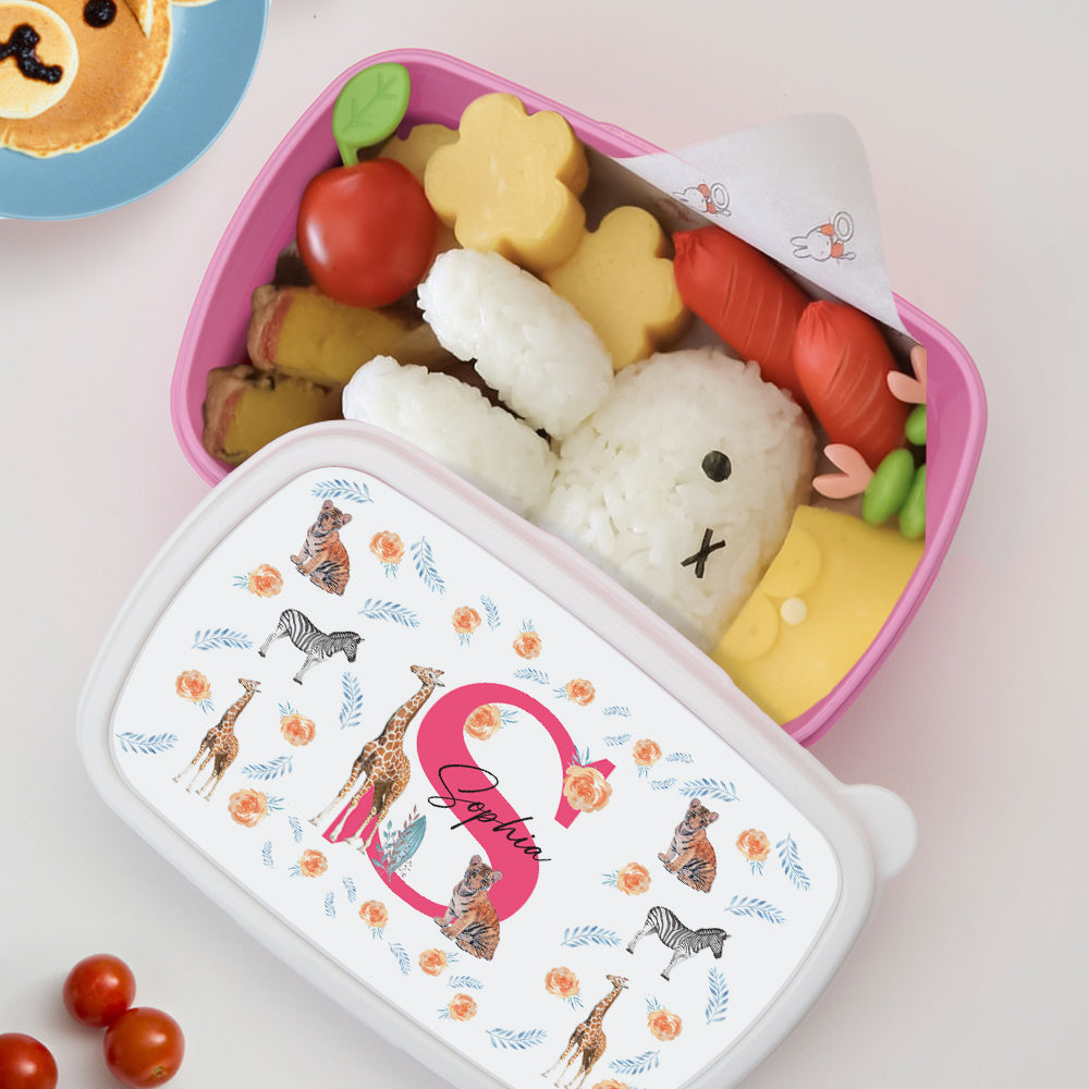 Close-up of personalised name on cute animal lunch box lid — custom name detail on children's lunch box