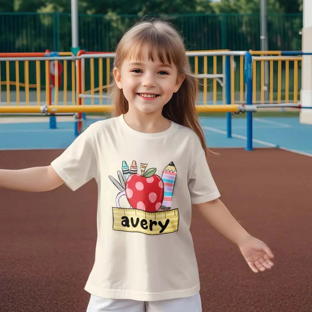 Personalised back to school T-shirt styled with school bag – ideal first day gift for boys and girls