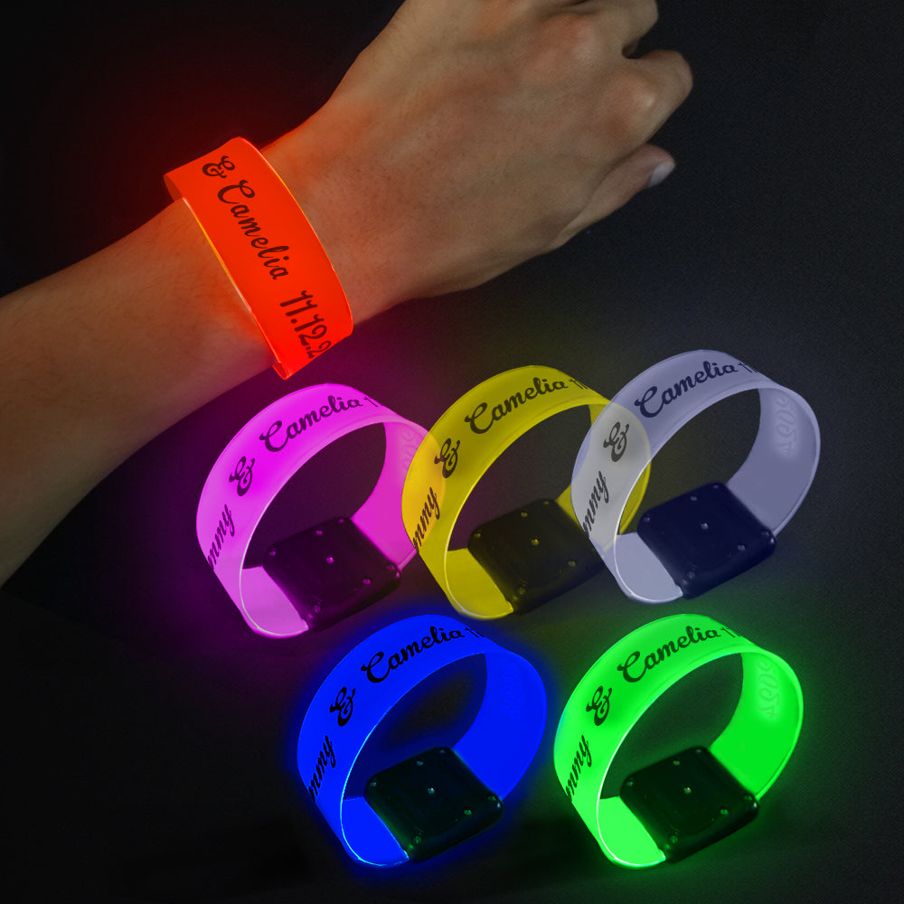 Set of personalised photo LED glow bracelets in different colours displaying custom photos — perfect wedding and birthday party favours