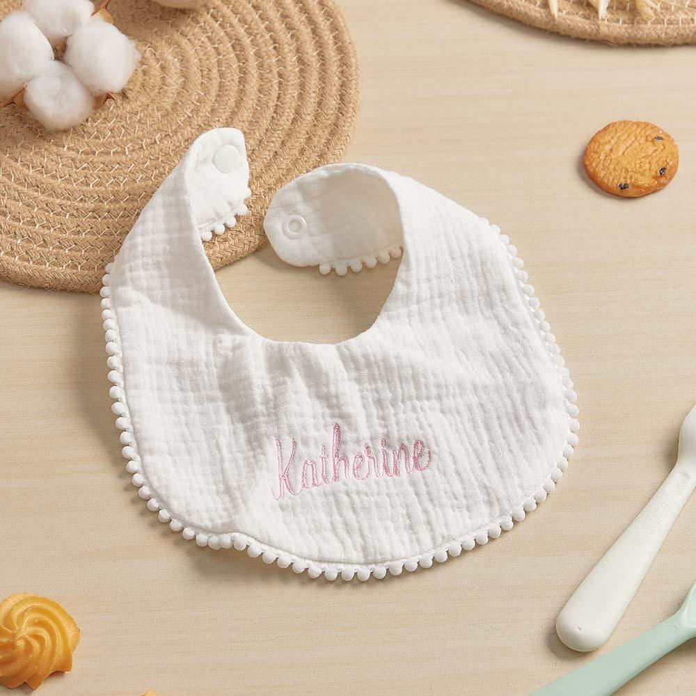 Personalised baby bib with embroidered name on soft absorbent cotton — perfect newborn gift and keepsake