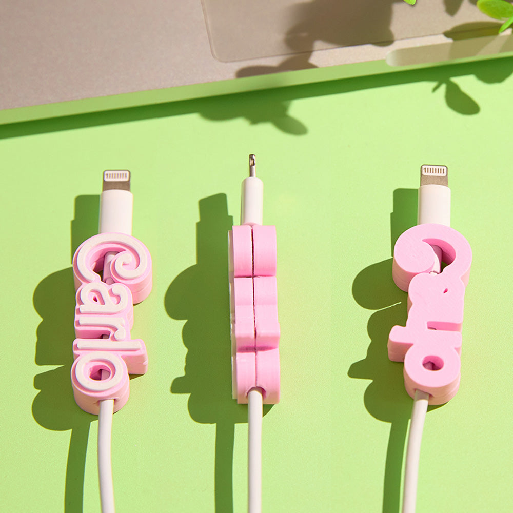 Side view of the compact cable organiser holding a charging cable, highlighting easy identification.