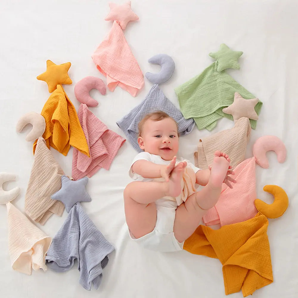 Close-up of embroidered name on personalised baby towel showing neat stitching on soft cotton star comforter, ideal baby shower gift