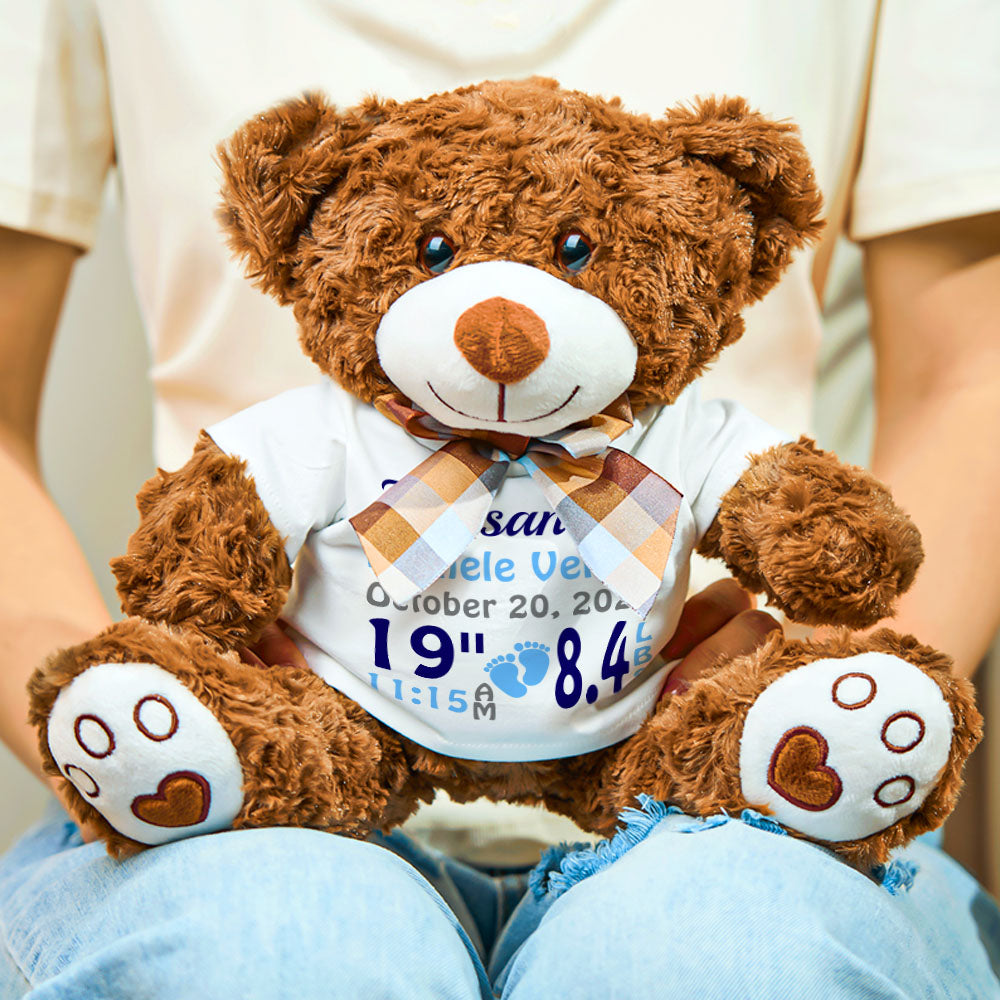Close-up of personalised name embroidery on bear plush — customised birth announcement teddy for baby shower gift