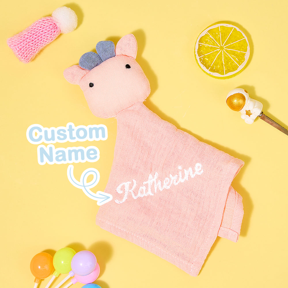 Detail shot of cosy soft cotton weave and neat embroidery on personalised soothe towel comforter
