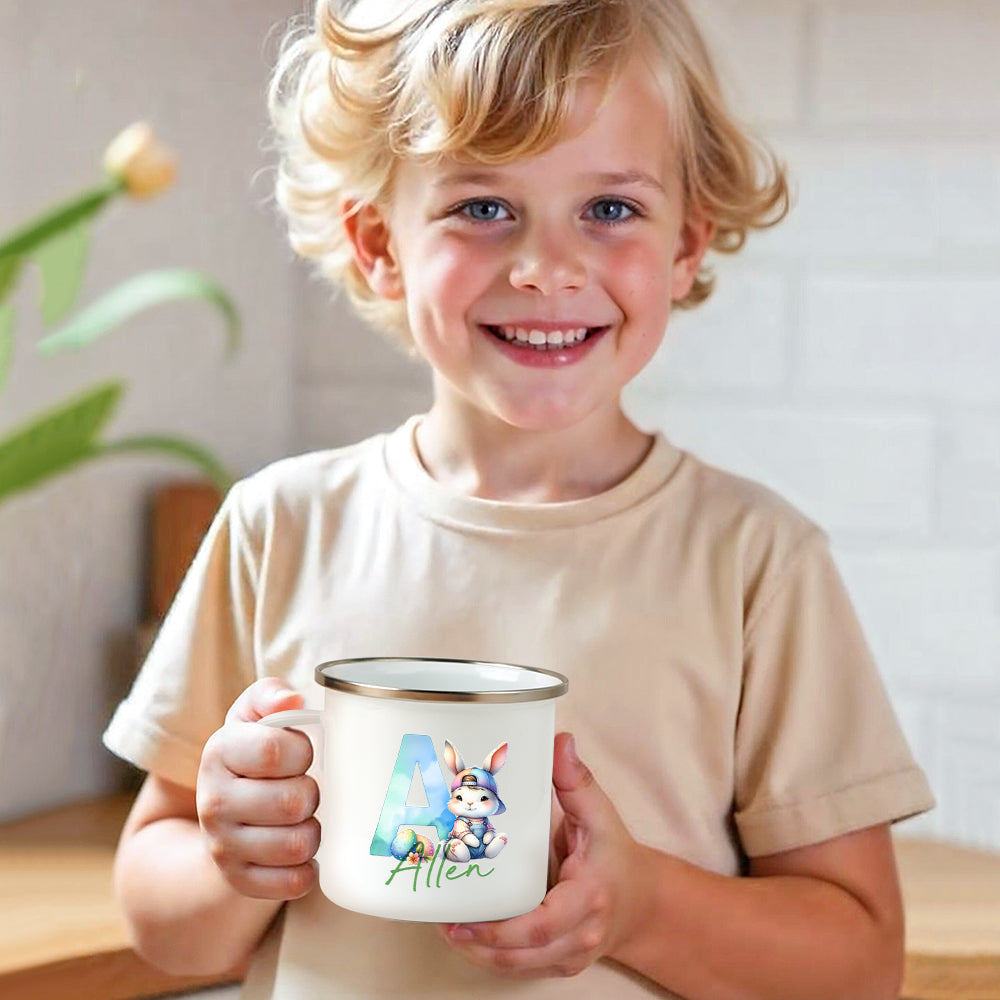 Side view of personalised bunny enamel mug showing seamless rim and sturdy handle — 12oz Easter gift for kids