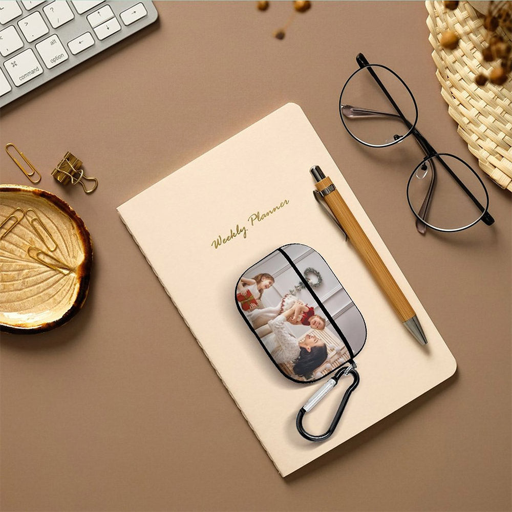 Flat lay of the personalised AirPods Pro case with integrated keychain, highlighting non-slip upper cover.