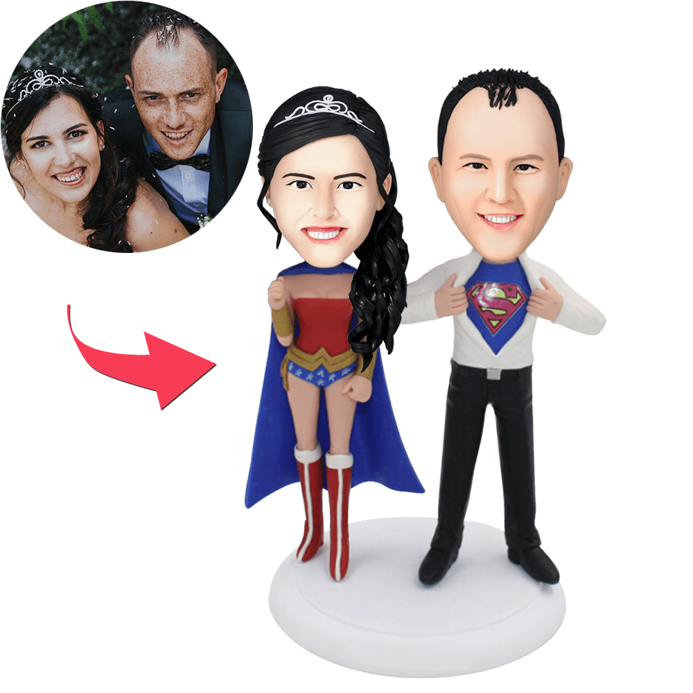 Personalised Superheroes Couple bobblehead with engraved text on base, high‑detail polymer clay collectible featuring customised heads from your photos, ideal anniversary or wedding keepsake