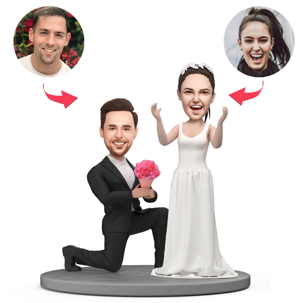 Personalised proposing couple bobblehead (polymer clay) with engraved base, showing proposal pose and custom heads — ideal personalised couple bobblehead Australia gift