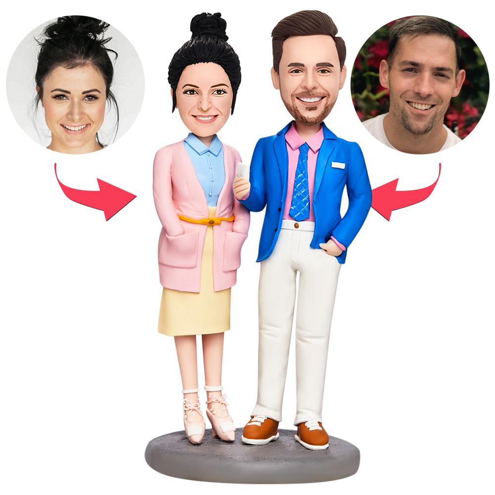 Valentine's personalised couple bobblehead in polymer clay — photo-matched custom heads with engraved text on the base, perfect personalised gift for an anniversary or Valentine’s