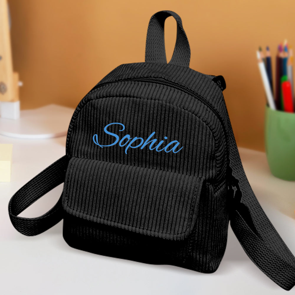 Back view of personalised mini corduroy backpack showing adjustable straps and sturdy zip – ideal for preschool