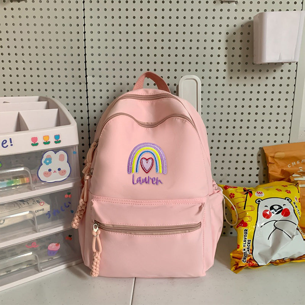 Zipper and interior compartment of personalised embroidered backpack, compact 26 cm x 32 cm x 13 cm ideal for school essentials
