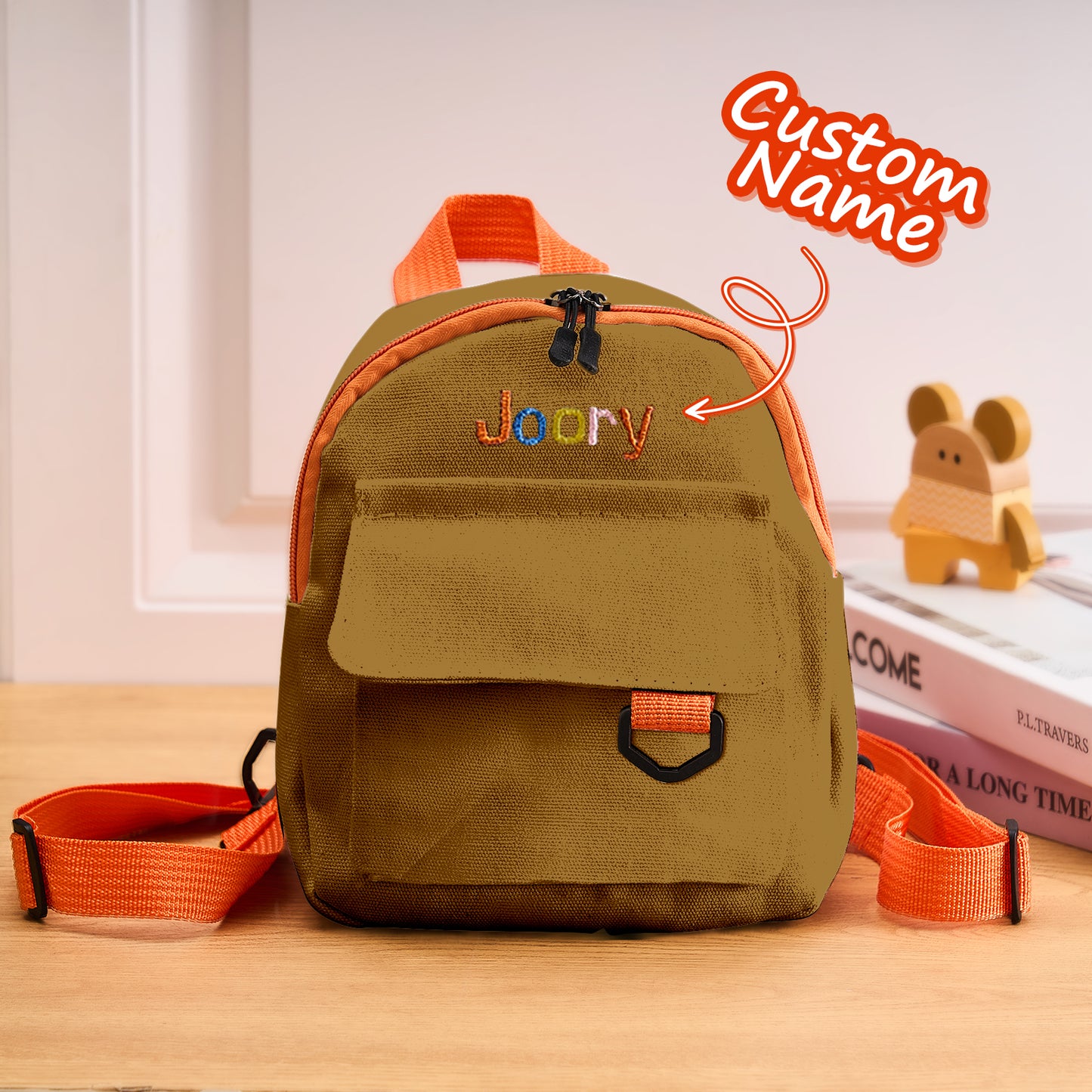 Side view highlighting corduroy fabric and small pocket on personalised mini backpack — perfect compact child school bag for daily use.