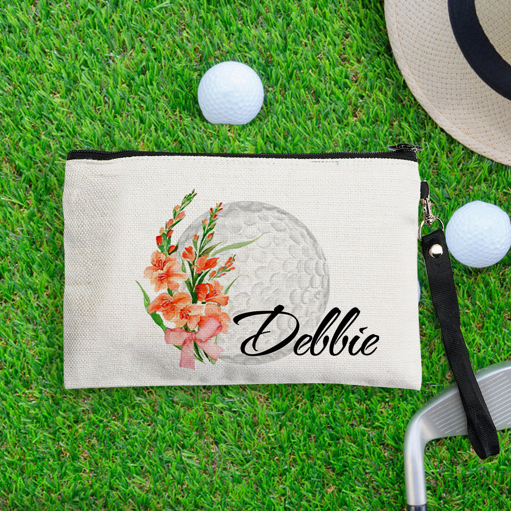 Compact personalised canvas cosmetics pouch in a handbag, featuring custom name, birth flower artwork and golf ball design — ideal travel organiser for toiletries and small accessories