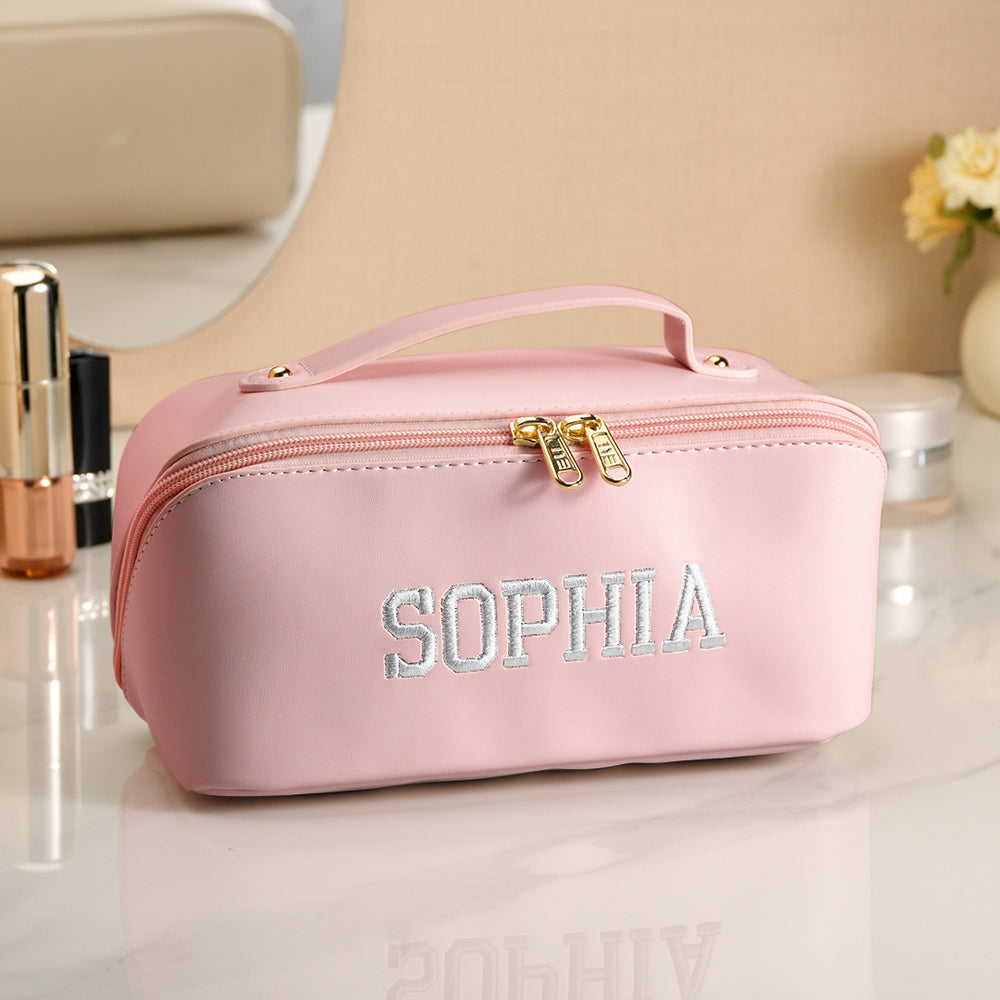 Personalised PU leather makeup bag in neutral beige showing elegant finish and embroidered name – perfect bridesmaid or birthday gift