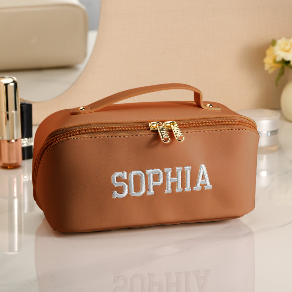 Collection shot of personalised embroidered makeup bags in multiple colours – customised gifts for her, bridesmaids and Mother's Day