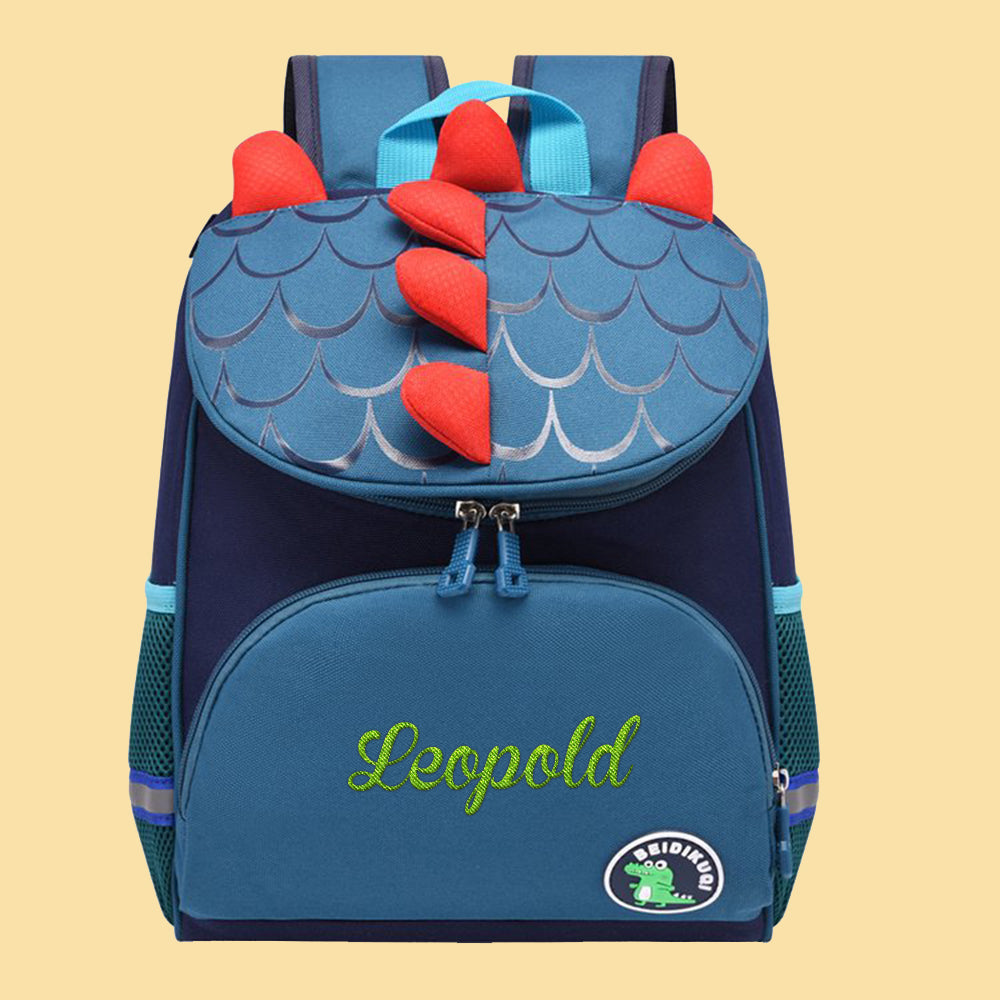 Side view showing zip pocket and roomy compartment of the personalised unicorn backpack – practical custom school bag for school essentials