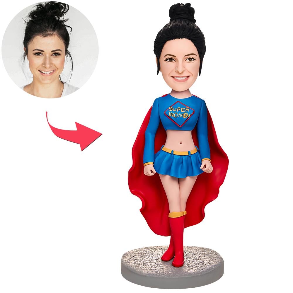 Front view of personalised sexy Superman girl bobblehead in polymer clay with customised head and engraved text on the base, bespoke gift