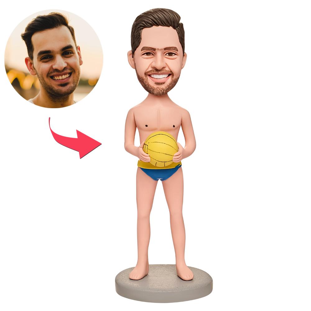 Personalised water polo boy bobblehead with custom head from a photo, hand‑finished polymer clay figurine in a sporty water polo pose with engraved base for name or date — ideal gift for players and fans