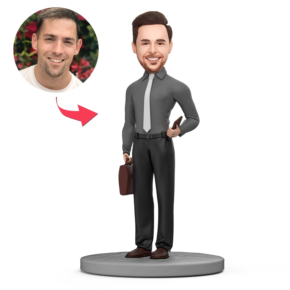 Personalised male teacher bobblehead in black suit, handmade polymer clay custom face figurine with engraved base — ideal teacher gift and mentor keepsake