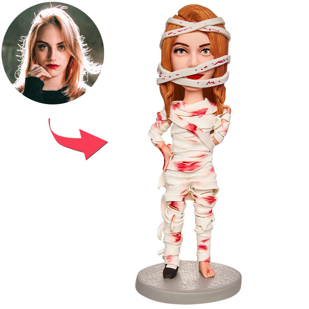 Personalised Halloween mummy bobblehead with custom portrait head and engraved text on base, polymer clay novelty gift