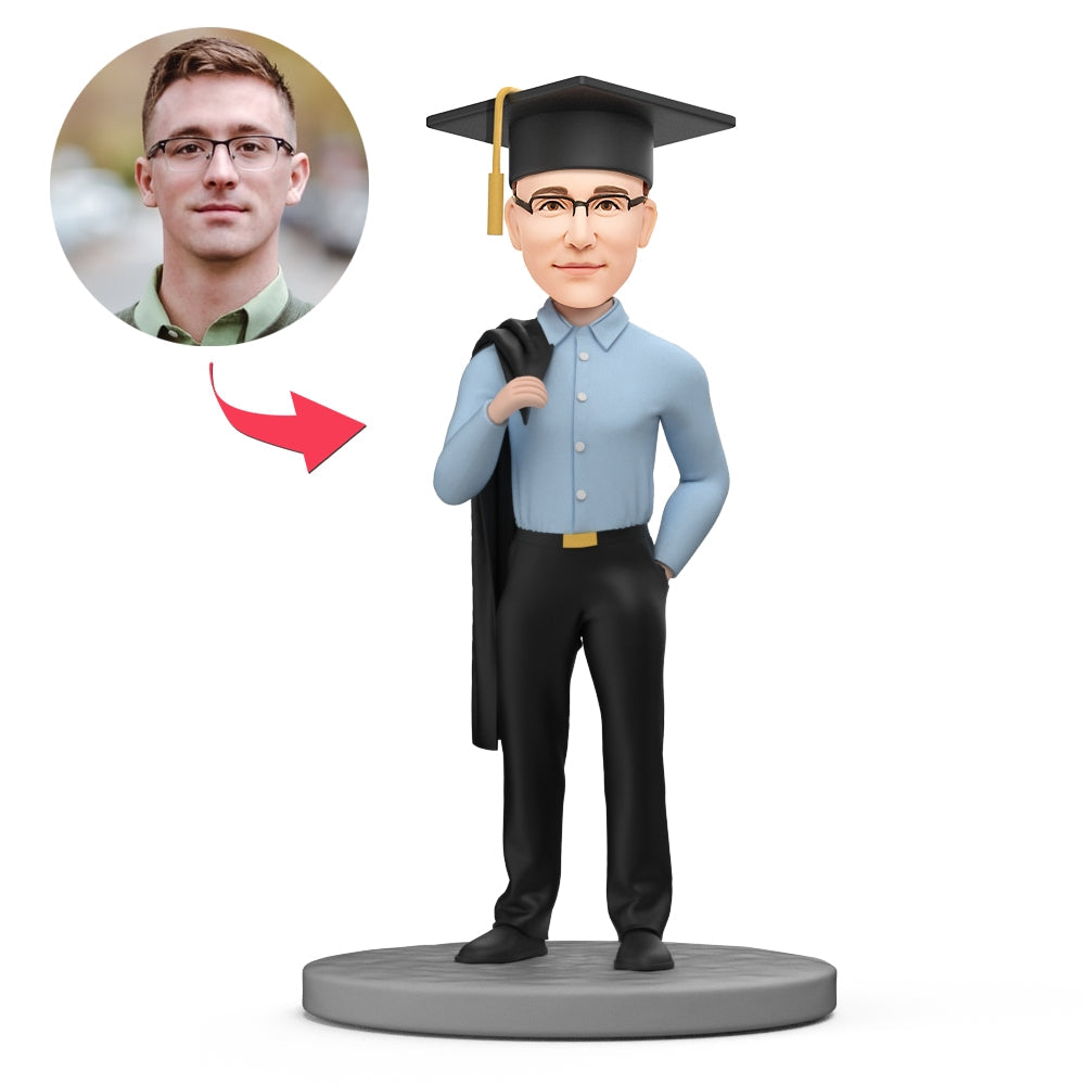 Personalised graduation bobblehead of a cool male graduate with bachelor gown draped over shoulder — custom polymer clay head matched to photo, ideal personalised gift for him