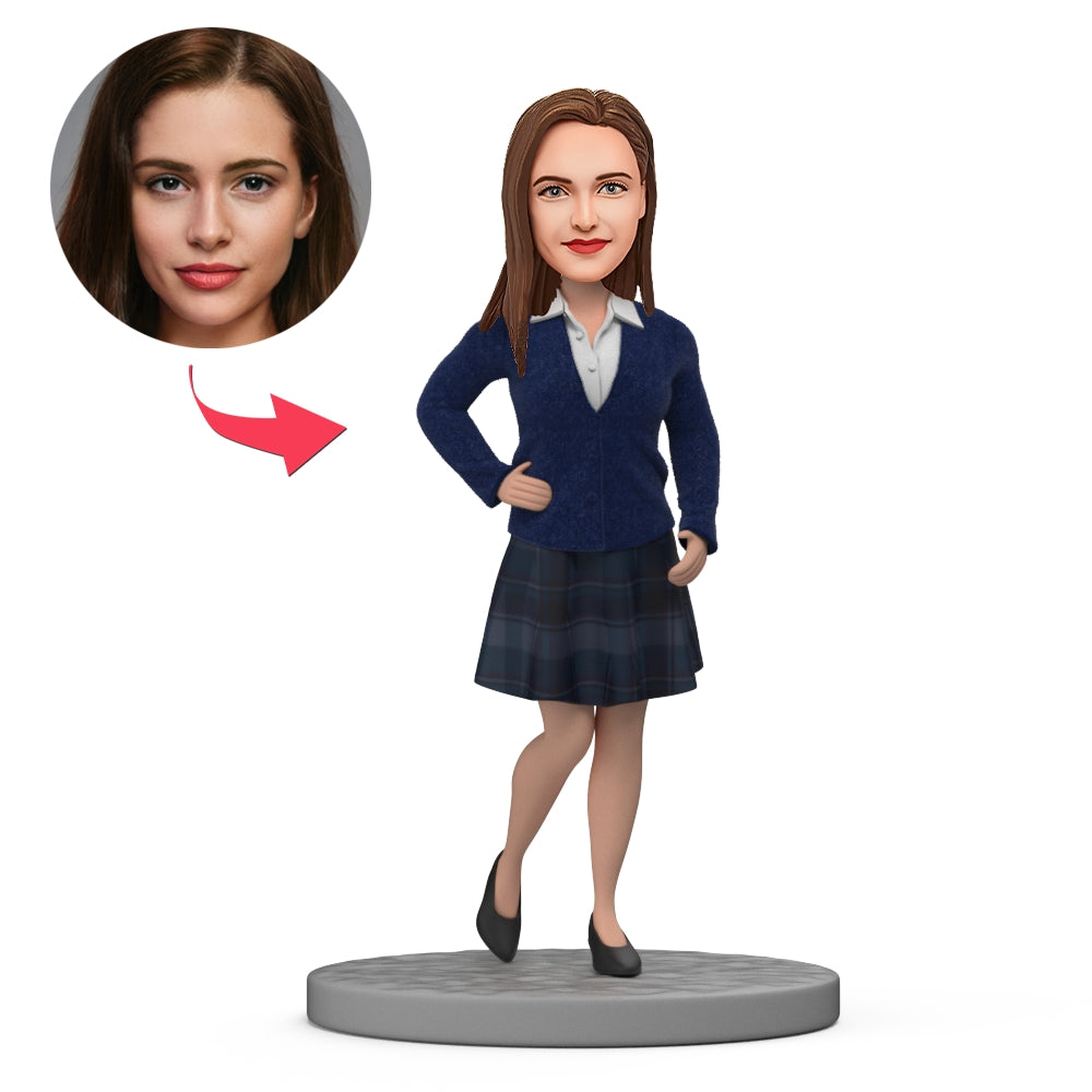 Personalised schoolgirl bobblehead in school uniform – polymer clay figurine with custom engraved base and personalised head