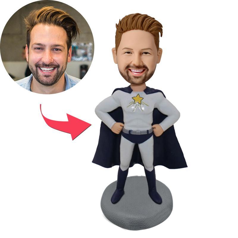 Personalised superhero bobblehead handcrafted in polymer clay — front view showing a customised head made from your photo with engraved name on the base, ideal custom polymer clay figurine gift