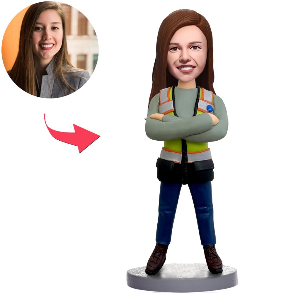 Personalised female worker bobblehead in polymer clay with customised head and engraved base text, handcrafted likeness ideal as a personalised bobblehead gift