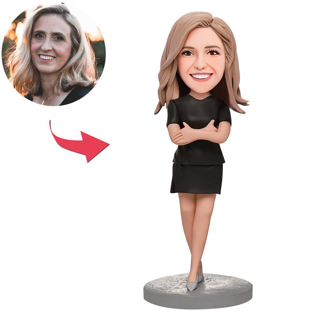 Personalised arms-folded business woman bobblehead with engraved name on base — polymer clay desk ornament, custom head created from your photo, ideal corporate gift