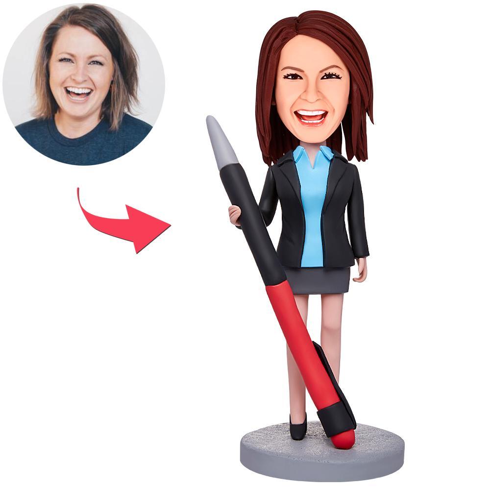 Personalised female boss bobblehead in polymer clay holding a pencil, with engraved base for custom text – bespoke gift for her (Mum, wife, colleague)